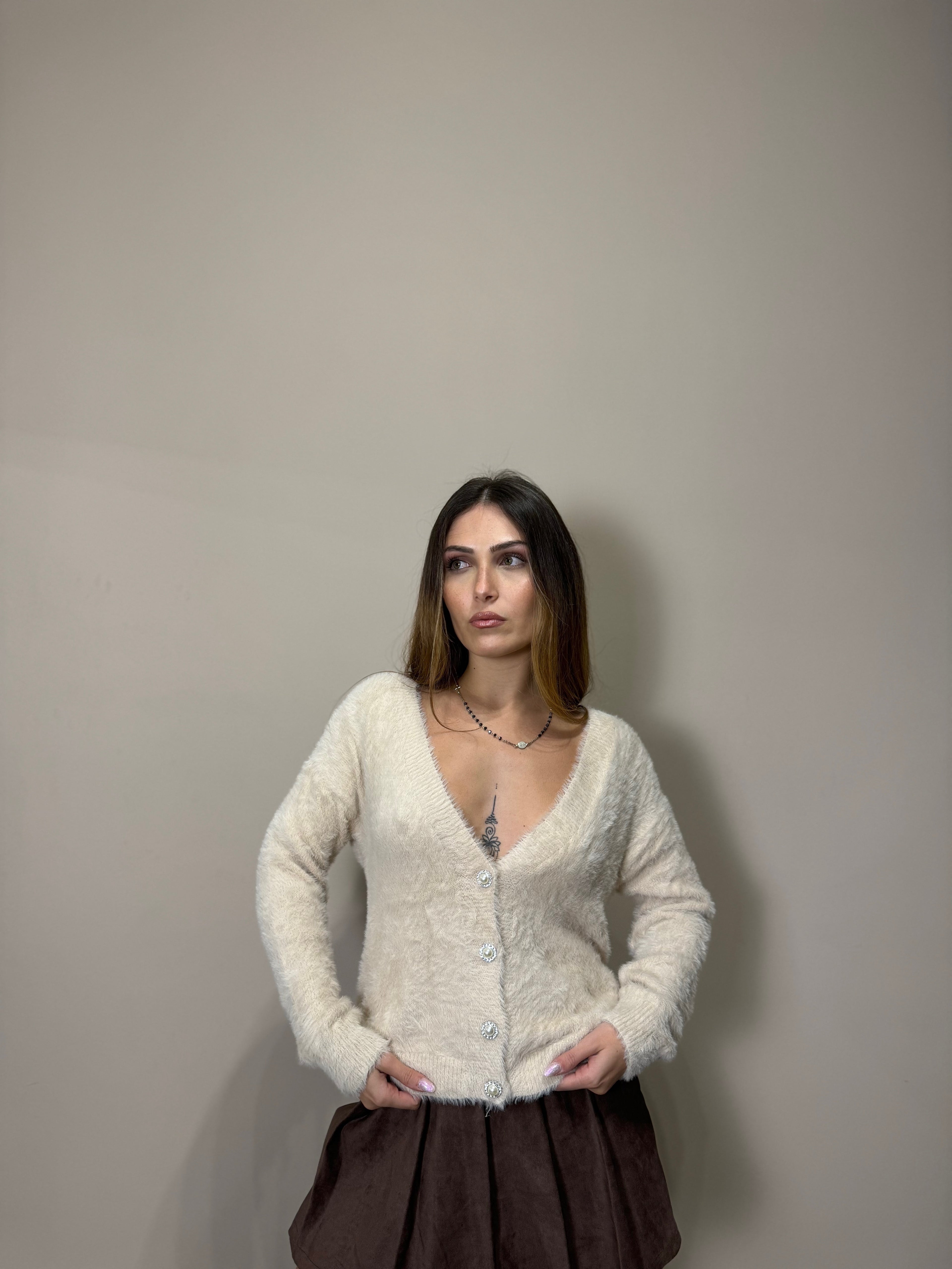 Cardigan peluchoso Power crema