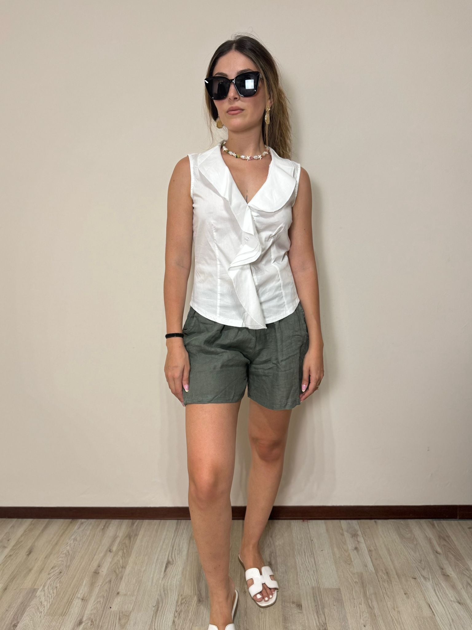 Camicia smanicata volant bianca